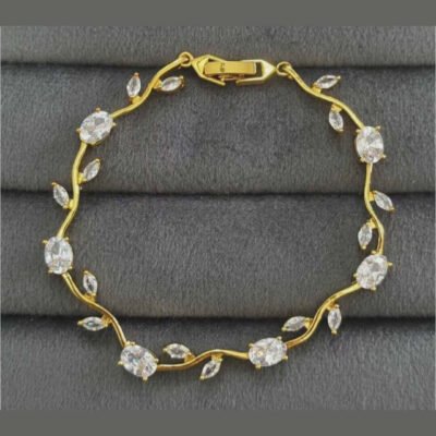 Tulip Bracelet features white crystal stones set in a gold-plated