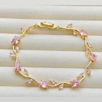 Tulip Bracelet features pink crystal stones set in a gold-plated